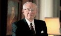 A portrait photo of President Gordon B. Hinckley wearing glasses and smiling.