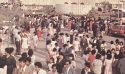 A large group of people around the Lima Peru Temple grounds.